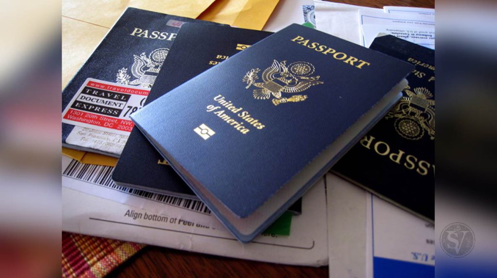 Presenting necessary travel documents like passport and visa
